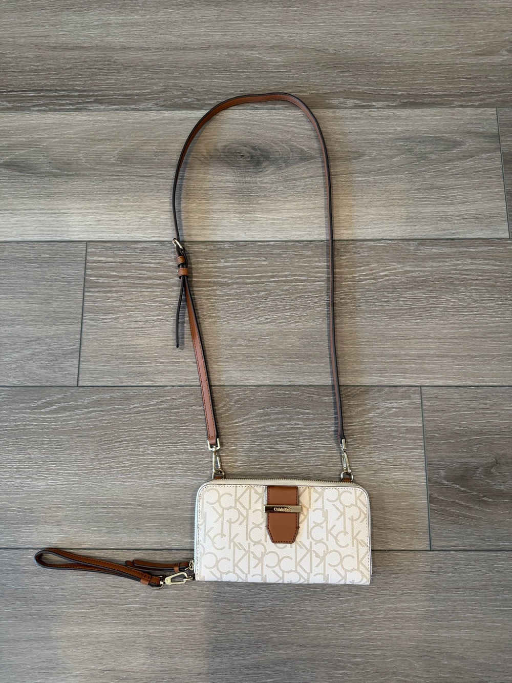 Calvin Klein Cream Logo Crossbody Wallet with Brown Trim and Strap